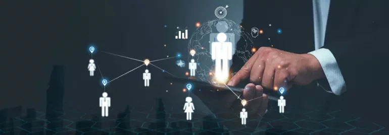 Hand interacting with a digital network of people icons