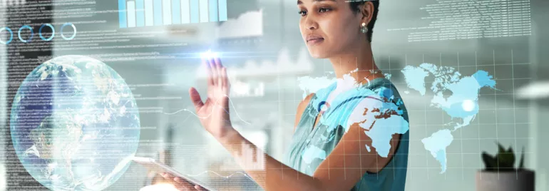 Woman interacting with digital world map and data interface.