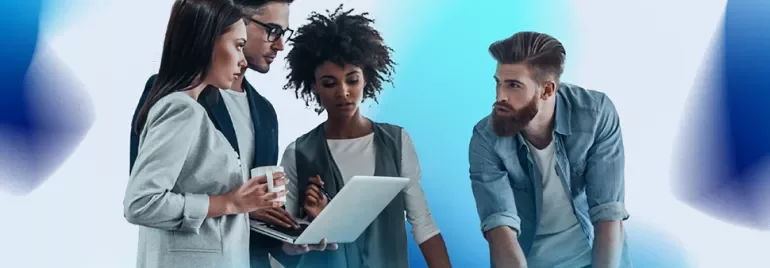 an image with a blue and white background and two males and two females engaging in a discussion and looking at a laptop