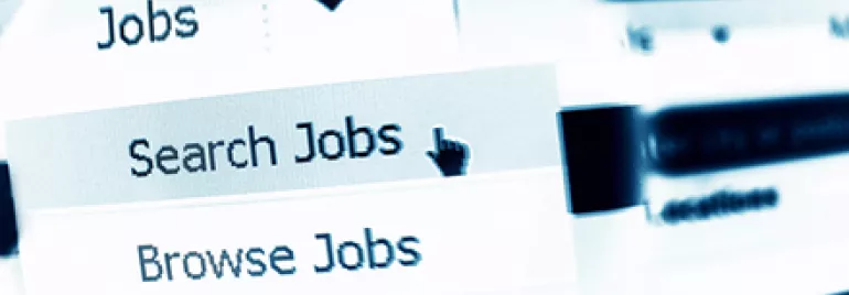 Close-up of a computer screen showing a menu with options: Search Jobs, Browse Jobs, Saved Search.