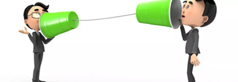 Two cartoon figures talking using green cups connected by string.