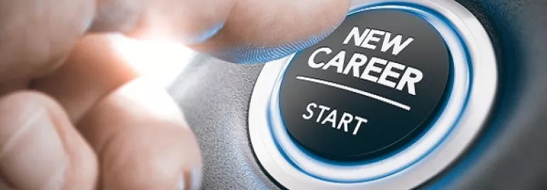 Hand pressing a button labeled 'new career start.'