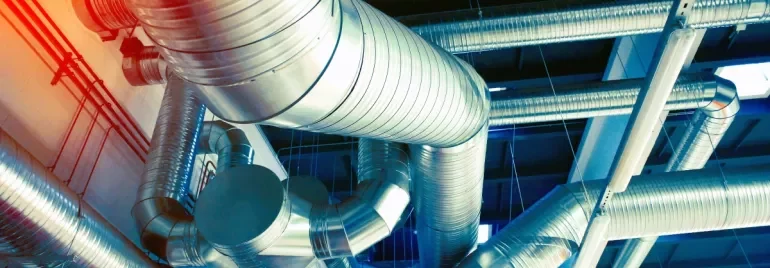 Network of metal air ducts in an industrial building