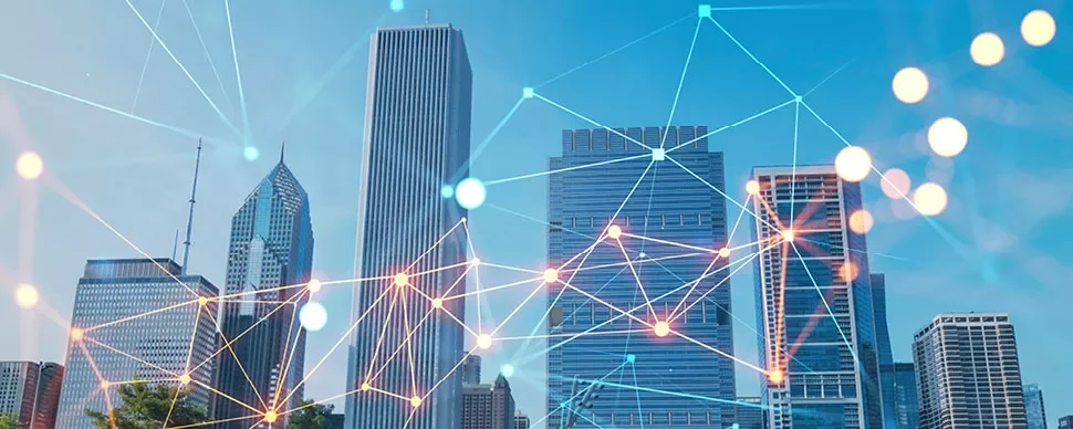 City skyline with abstract network lines overlaying tall skyscrapers.
