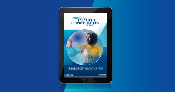 Tablet displaying a guide to salaries and hiring strategy in 2023.