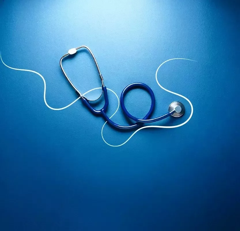 A blue stethoscope placed on a blue surface, outlined by a white curved line suggesting medical care and diagnostics.