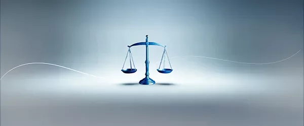 A blue balance scale centered on a light gradient background, accentuated by a white curved line representing fairness and legal equilibrium
