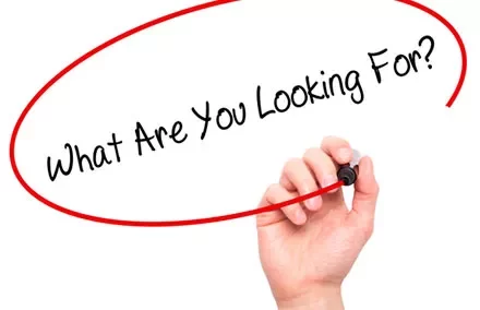 Text saying 'What Are You Looking For?' inside a red circle.